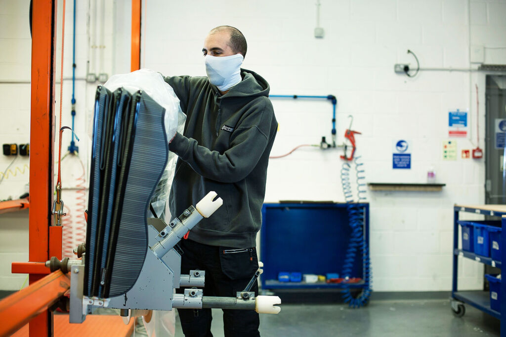 Samuel Walker working in the Caribbean Blinds UK Factory