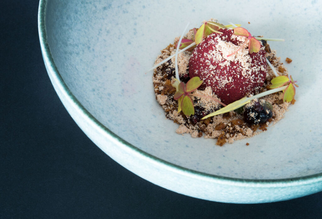 Hedgerow bramble, brown butter crumb, pine.