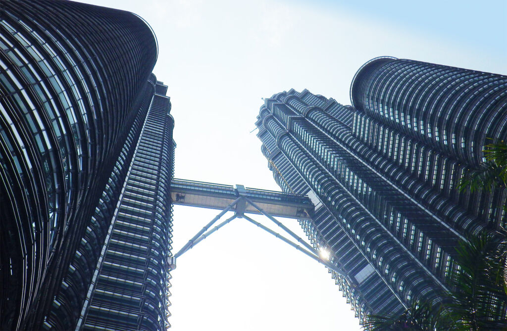 Looking up at The Petronas Towers in Kuala Lumpur Malaysia