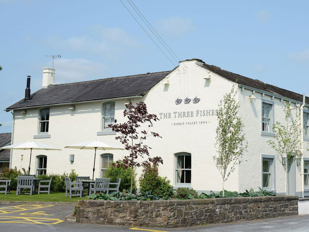 The exterior of The Three Fishes public house and restaurant