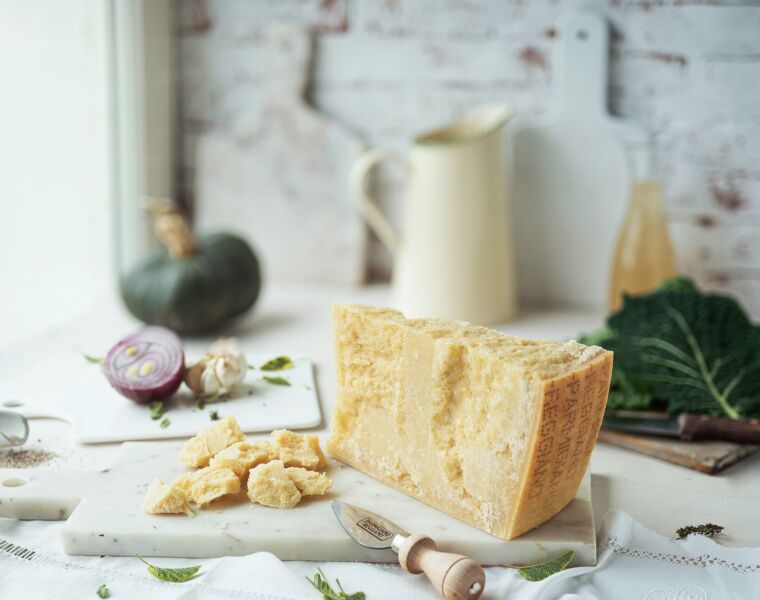 A slice of Parmigiano Reggiano cheese