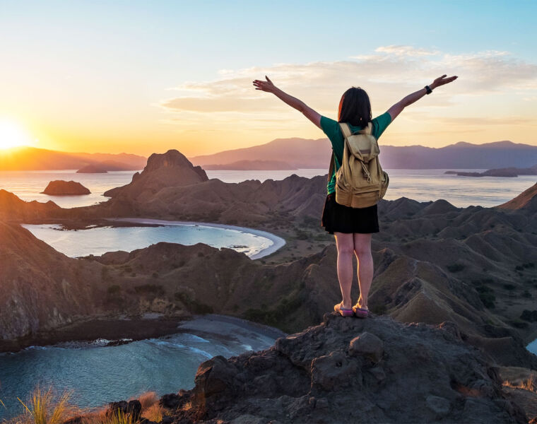 Woman celebrating in Komodo National Park in Indonesia