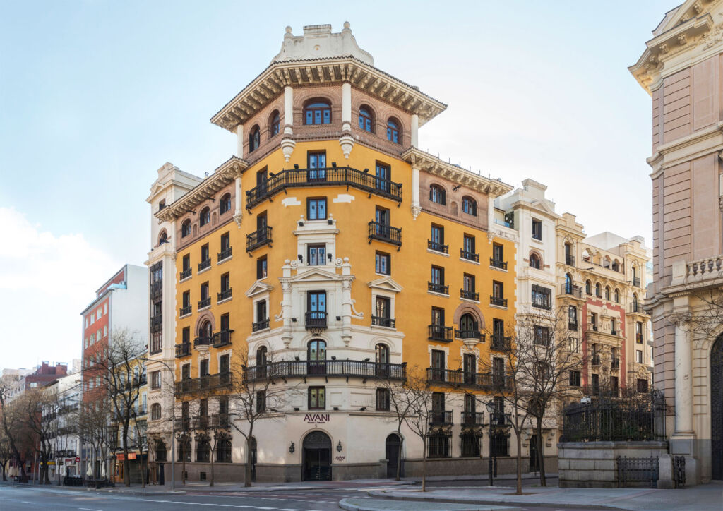 The mustard and cream colour exterior of the classic-looking hotel