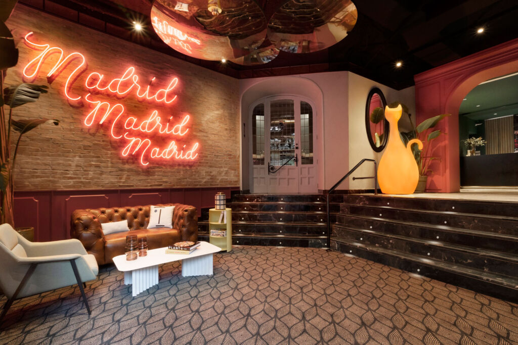 The hotel's trendy lobby with its large yellow cat sculpture