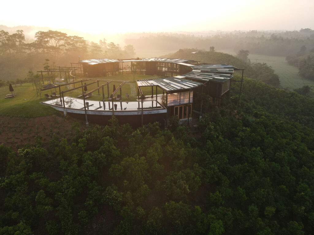 An aerial view of the property on a misty morning