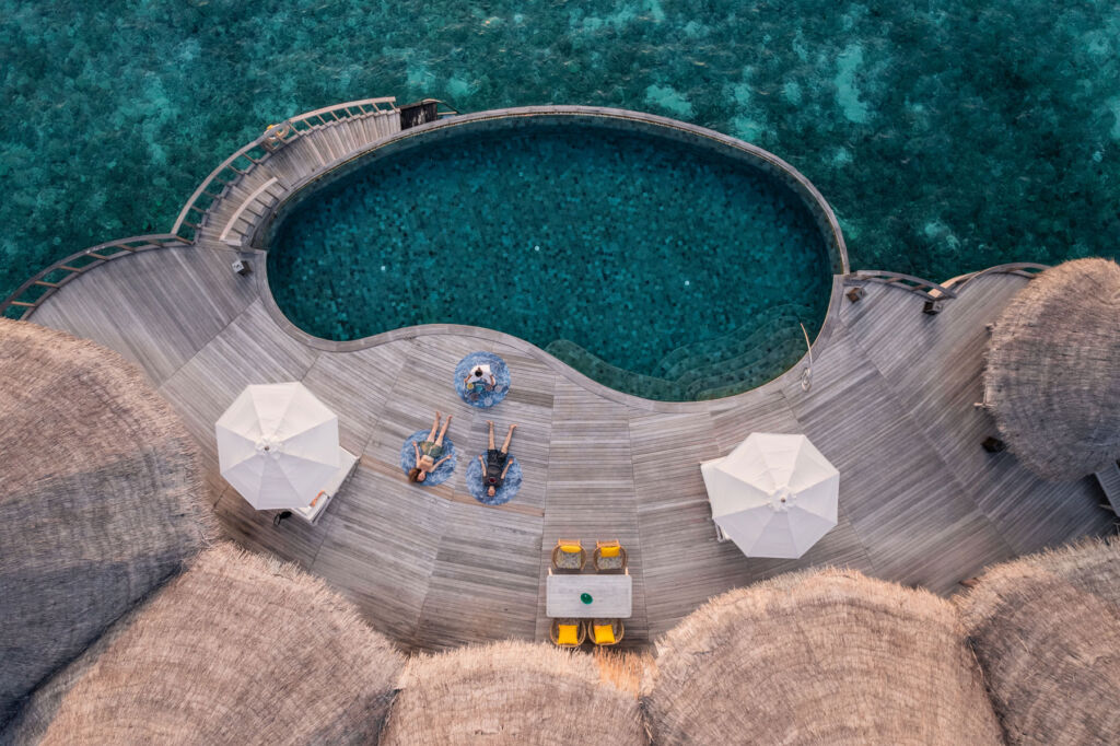 An aerial view of one of the therapy sessions being performed on the decking over the water