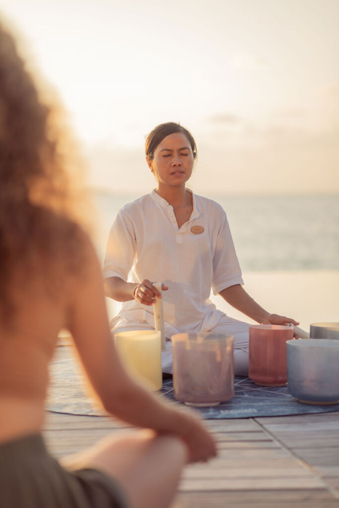 Sound therapy on the beach at the private island resort