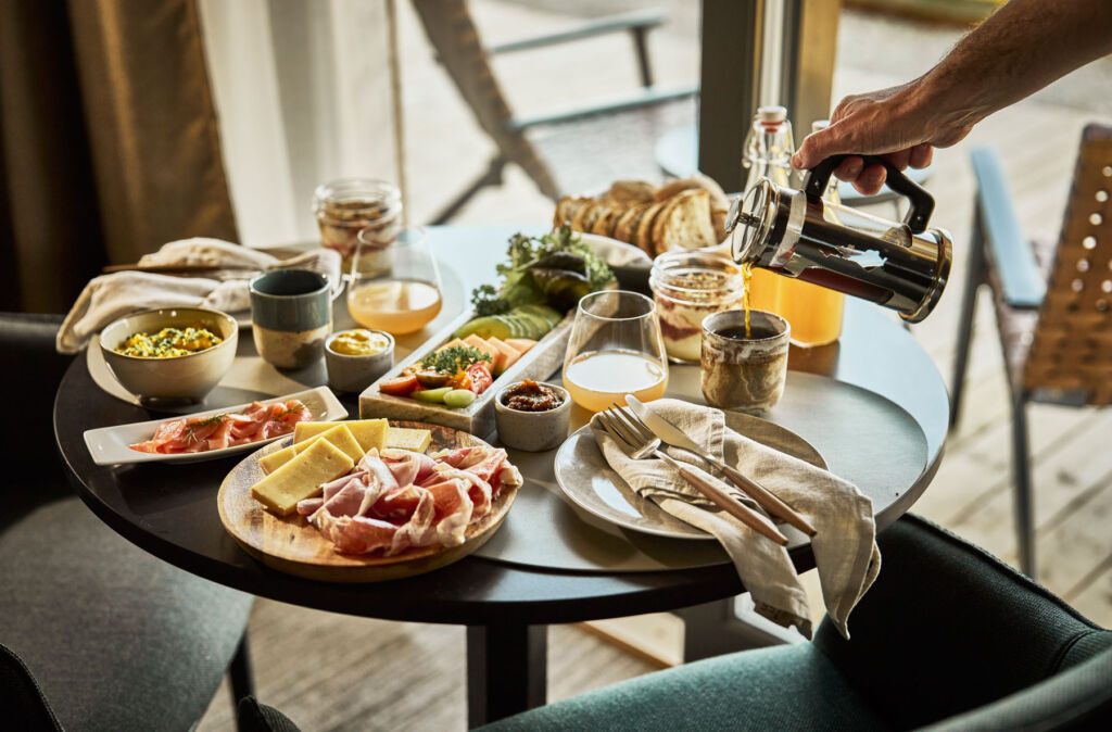 A table of food dishes made with fresh local produce