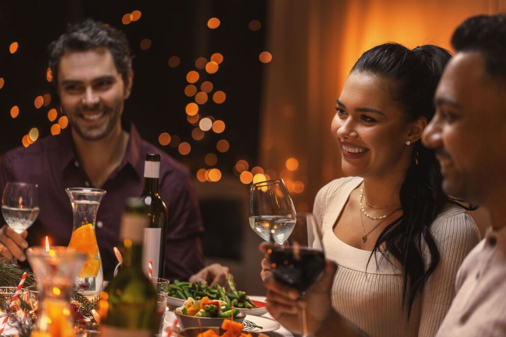 Friends sharing food and drinks at a table