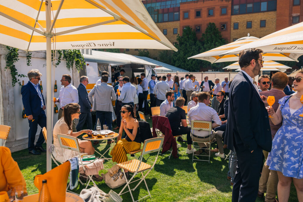 Guests enjoying the hospitality at the Concours event