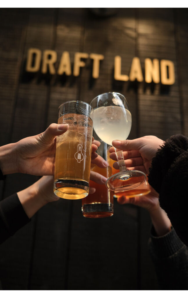 Guests making a toast at Draft Land