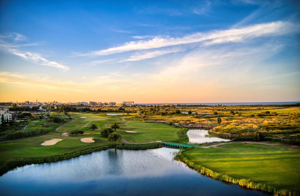 An aerial view of the course at sunset