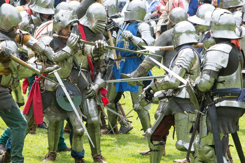 Knights in armour in simulated combat