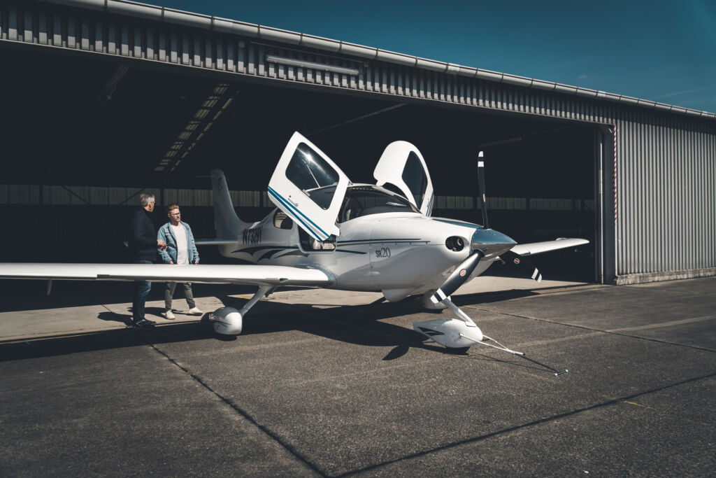 One of the aircraft exiting the hangar