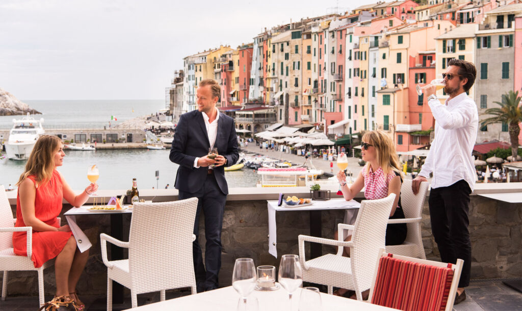 Guests enjoying a refreshing drink on the Venus Bar Terrace