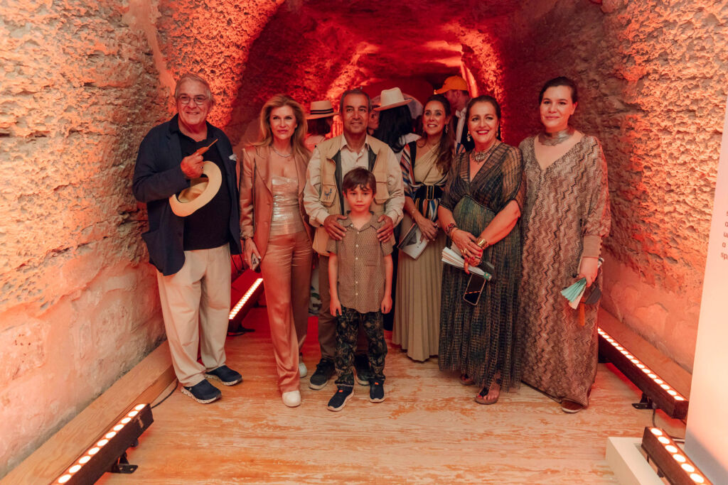 Guests enjoying the event inside the monuments stone corridors