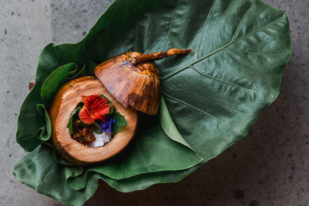 A food dish served on a Pandan leaf