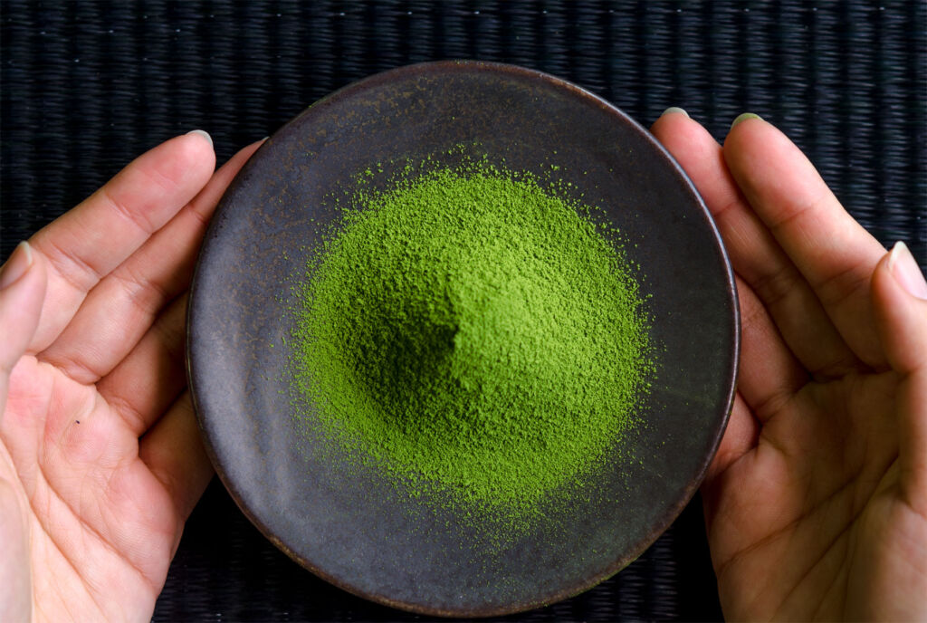 A bowl of bright green coloured Matcha powder