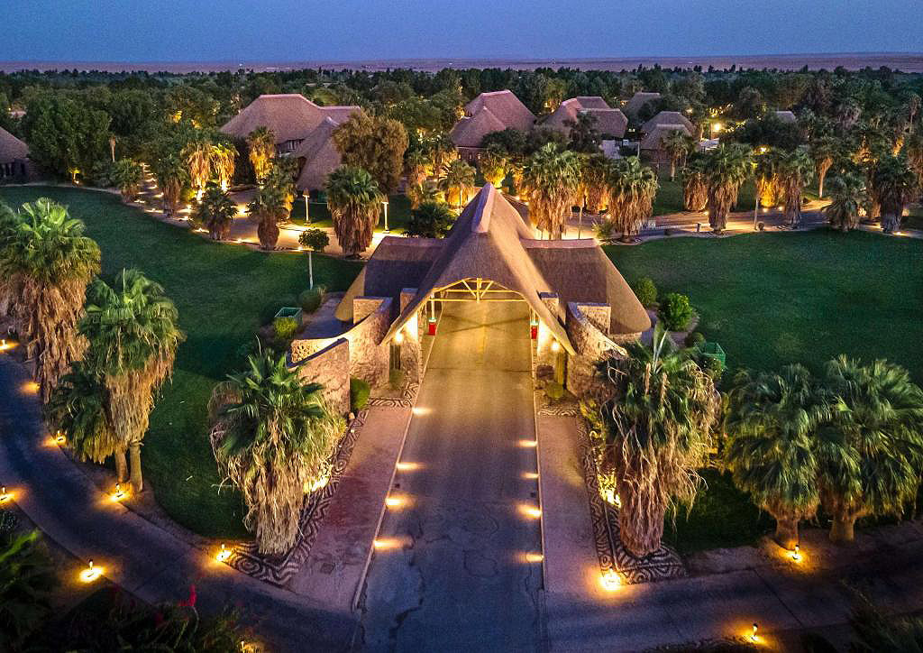 The entrance to the resort at night