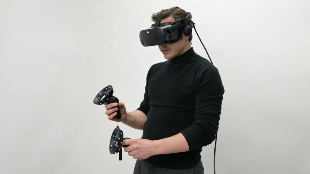 A man using the two hand controllers