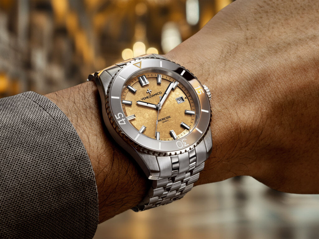 A photograph of the new timepiece worn on a man's wrist