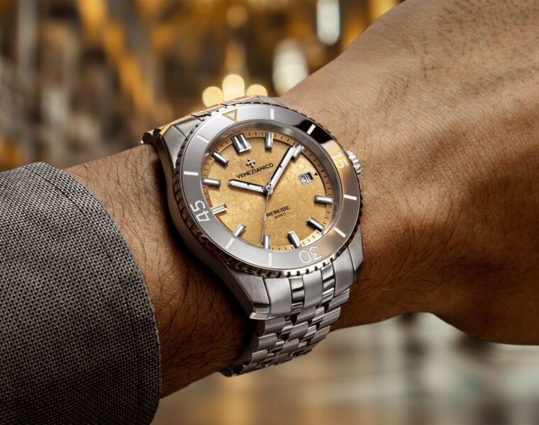 A photograph of the new timepiece worn on a man's wrist