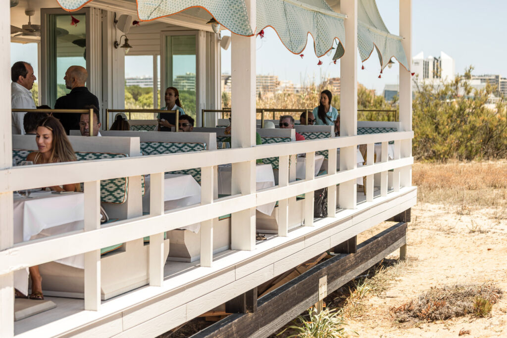 The exterior of the restaurant on the beach