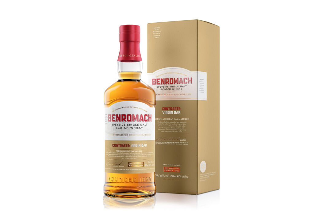 A bottle of the Benromach next to its gold-coloured box