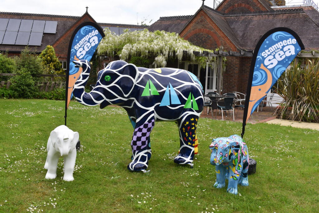 Some of the painted elephants in the grounds of the hospice