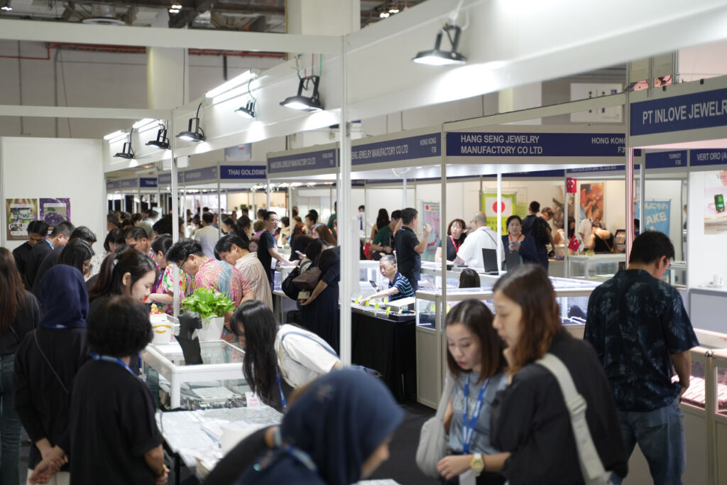 Attendees browsing the many stalls and booths