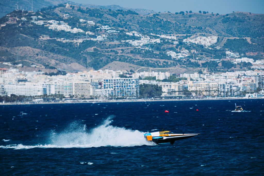 The Team Blue Racing boat speeding across the water