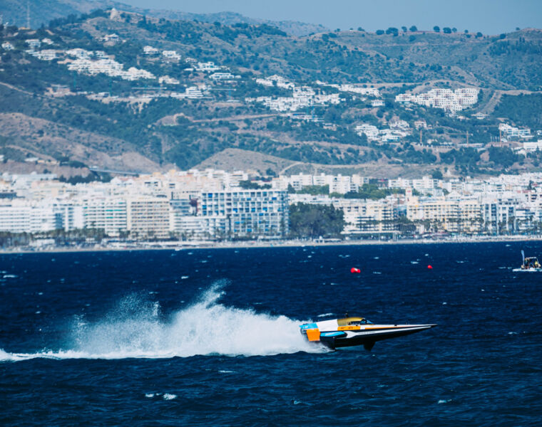 The Team Blue Racing boat speeding across the water
