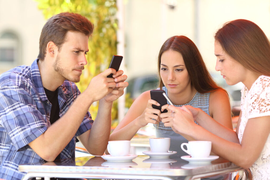Young people addicted to social media on their mobile phones