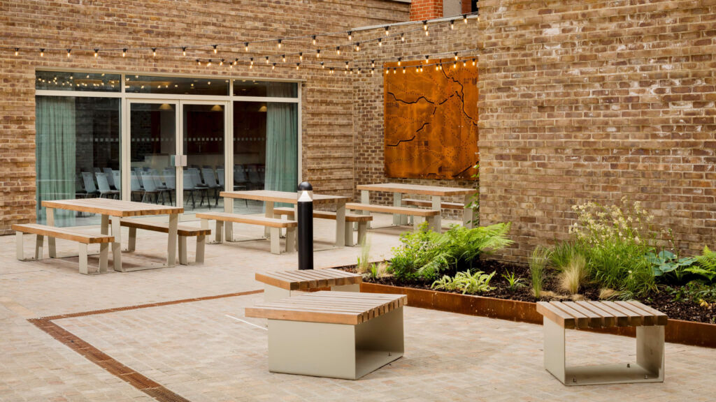 One of the outdoor spaces with tables and chairs