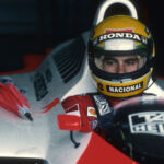 Senna waiting in his car out of the rain in 1988