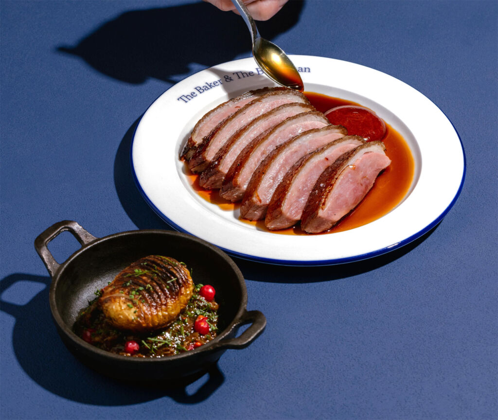 14 day dry aged duck with ruby plum and hasselback potato