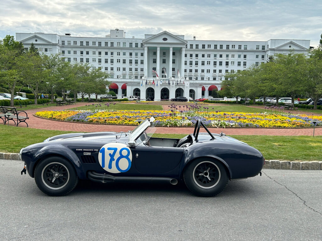 A side view of the car outside a European Palace