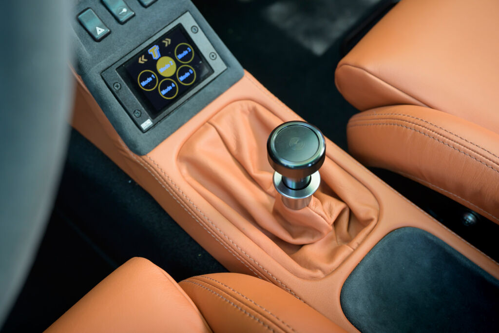 The leather clad gear stick