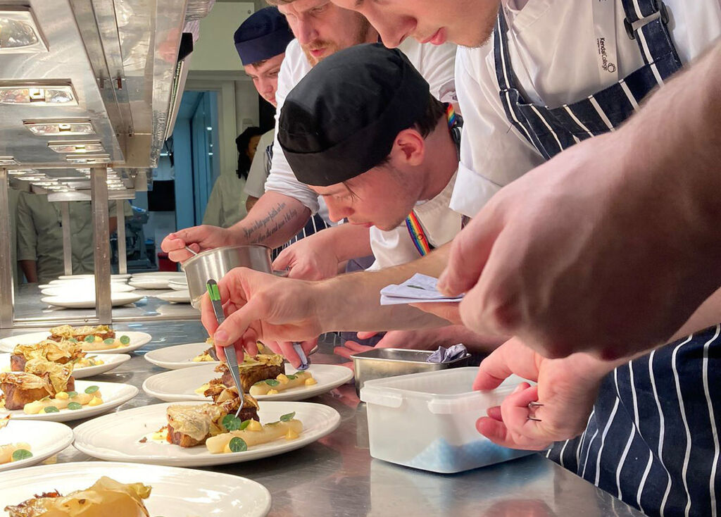 Young chefs working in a kitchen