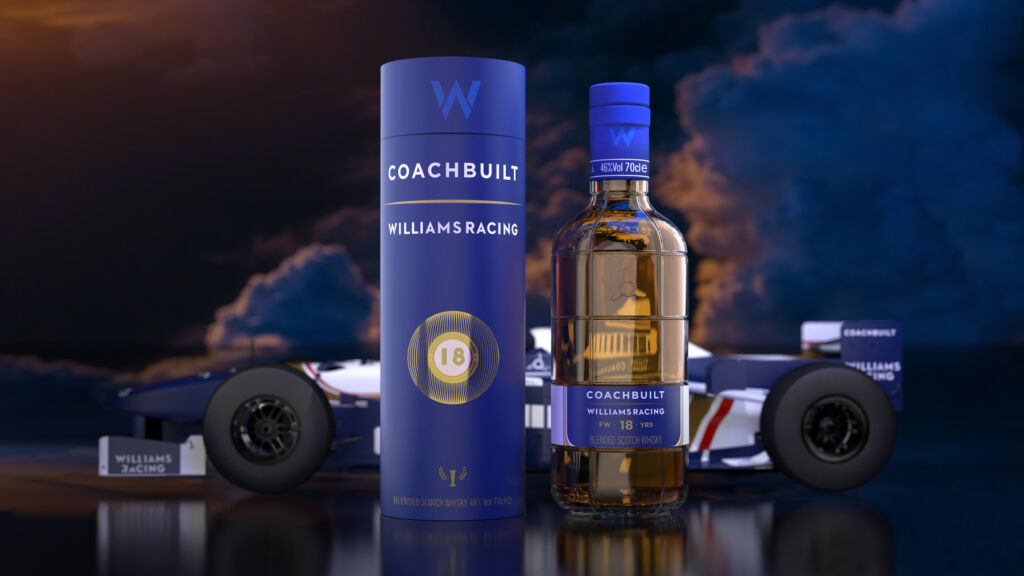 The Coachbuilt and Williams Racing Limited Edition 18 Year Old bottle and box in front of an F1 car