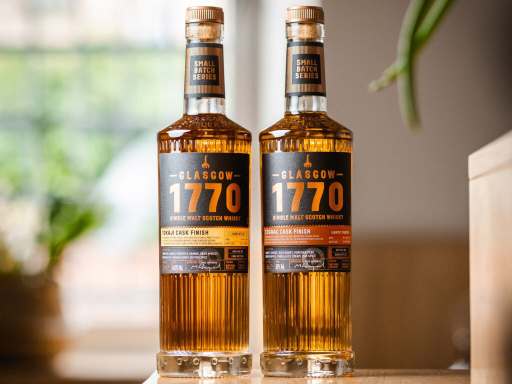 Bottles of the Glasgow 1770 Cognac Cask Finish and Tokaji Cask Finish on a table