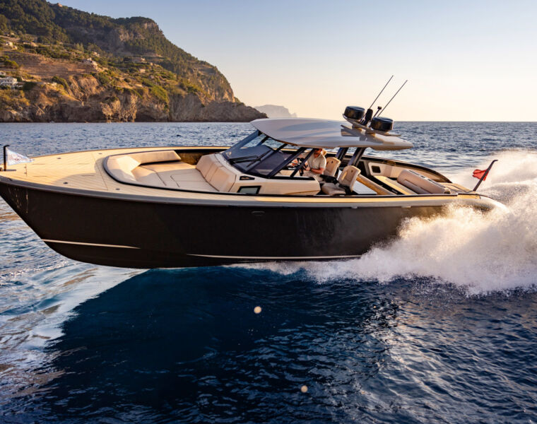 The boat travelling at speed on the water