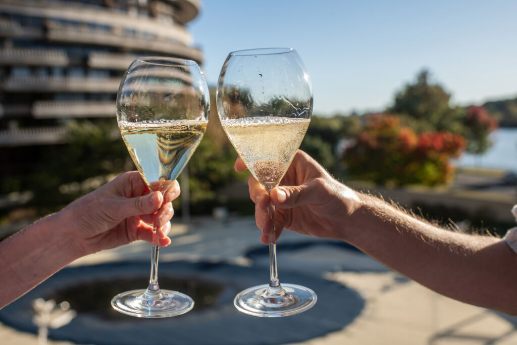 People toasting with glasses of Champagne