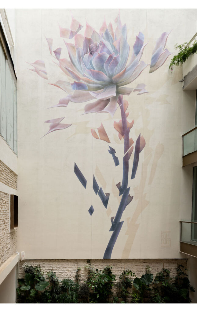 The large mural on the side of the property