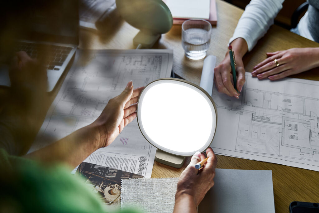 The light being used during an office meeting