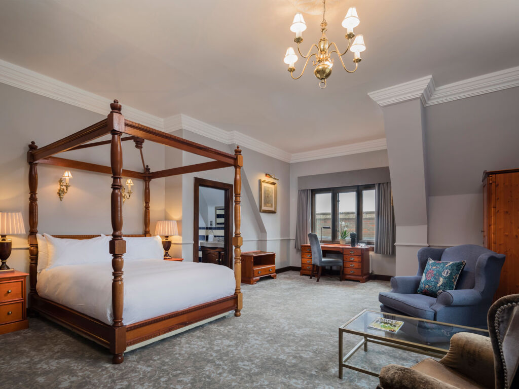 A traditional four poster bed in the Manor House