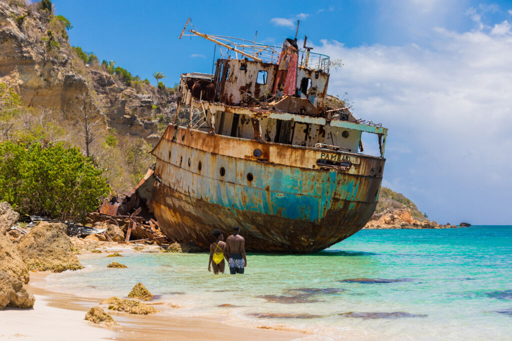 A couple admiring a shipwreck