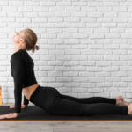 A woman doing the cobra stretch