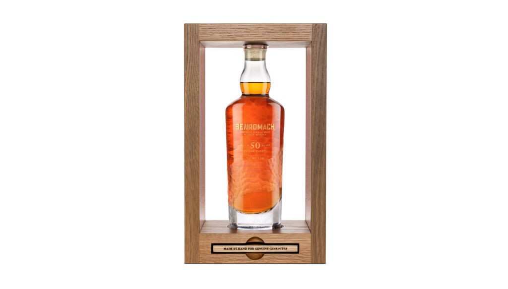 Benromach 50 Years Old in its wooden case on a white background