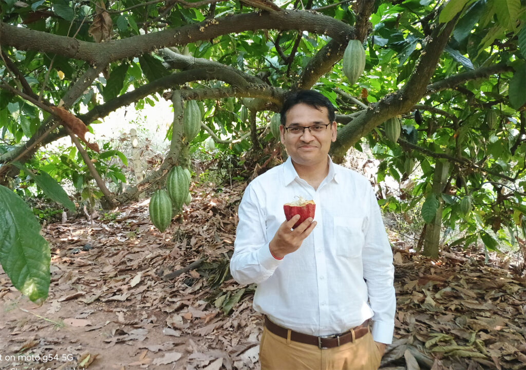 Nitin Chordia inspecting some of the beans